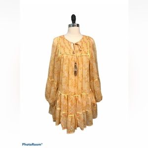 Free People Swinging Printed Yellow Mini Dress With Floral Print And Gold Tassel
